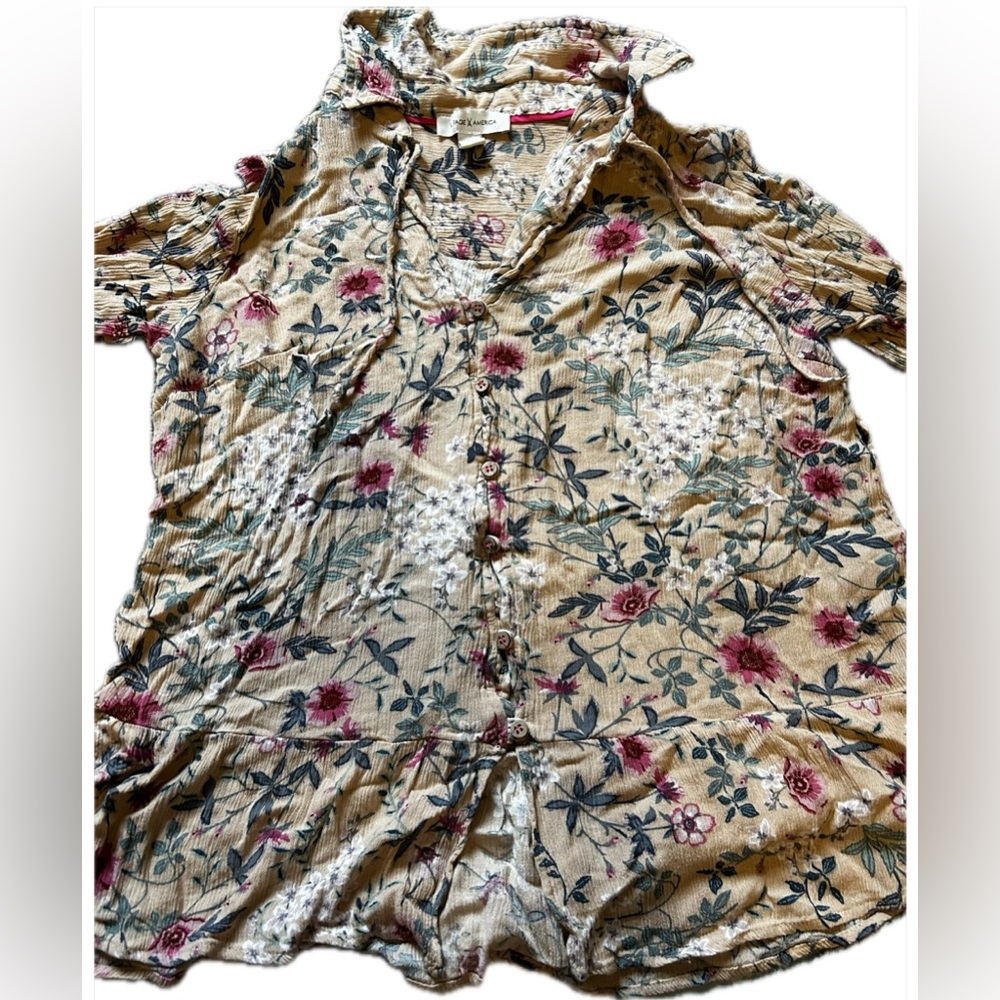 Tan floral womens shirt.